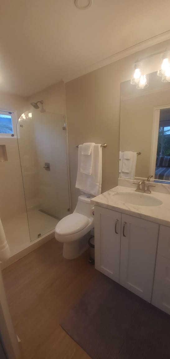 Bathroom with glass shower enclosure