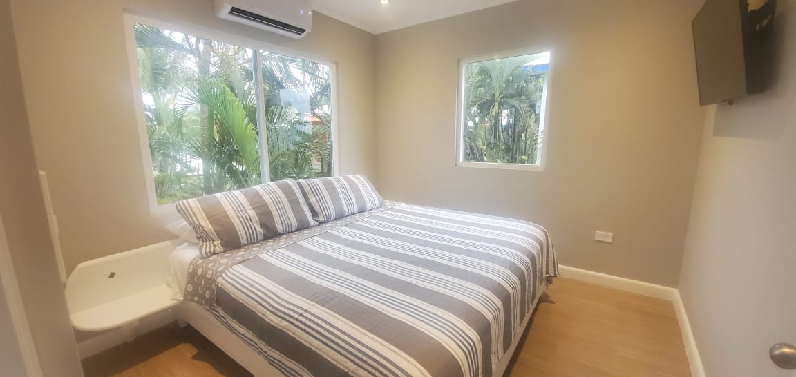 Queen bedroom with tropical garden views